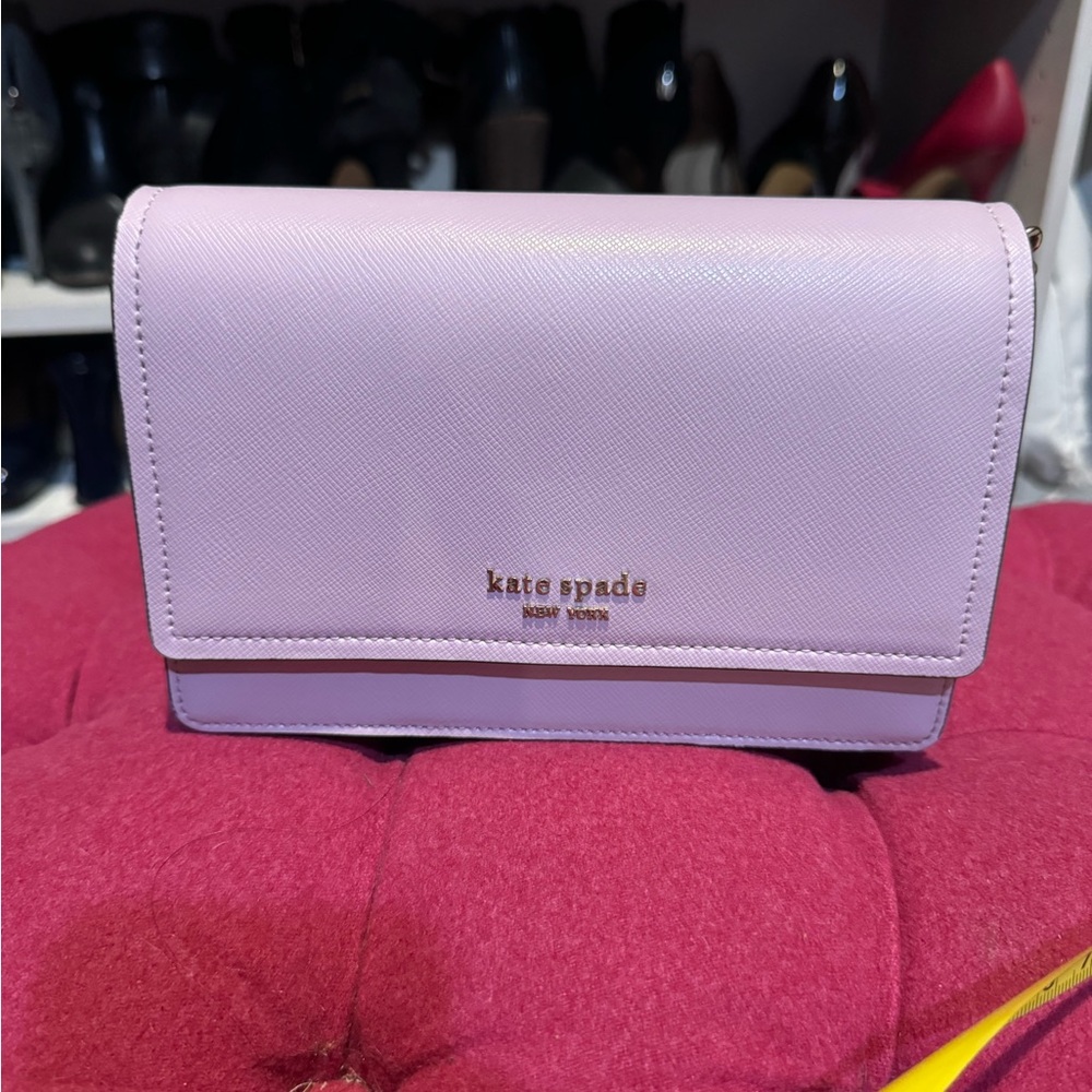 Kate Spade lilac wallet on a chain